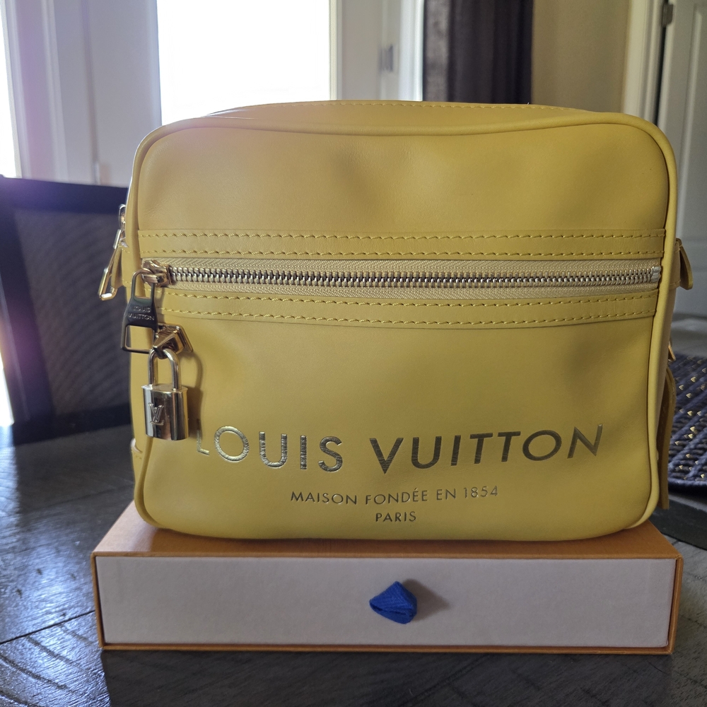 Vintage Louis Vuitton 2009 Take Flight Yellow Crossbody with Minimalist Design